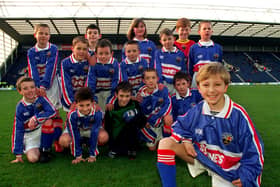 Winners of the Lancashire Evening Post\Preston North End\McDonalds design a kit competition, St Annes RC Primary School, Leyland, celebrate by showing off their winning design before the PNE v Oldham game. 
The kit was designed by pupil Ben Ward, pictured with his class mates