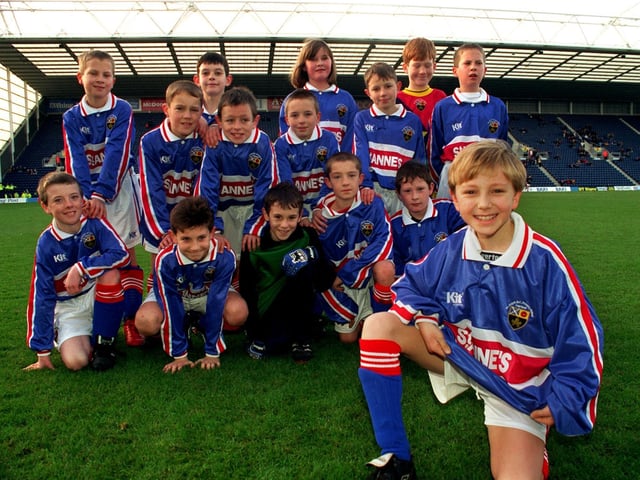 Winners of the Lancashire Evening Post\Preston North End\McDonalds design a kit competition, St Annes RC Primary School, Leyland, celebrate by showing off their winning design before the PNE v Oldham game.
The kit was designed by pupil Ben Ward, pictured with his class mates