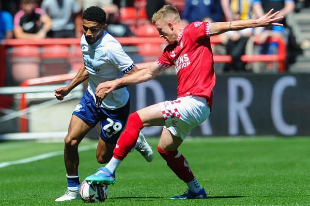 Kaine Kesler-Hayden battles with Bristol City's Ross McCrorie (photo: Ian Cook/CameraSport)