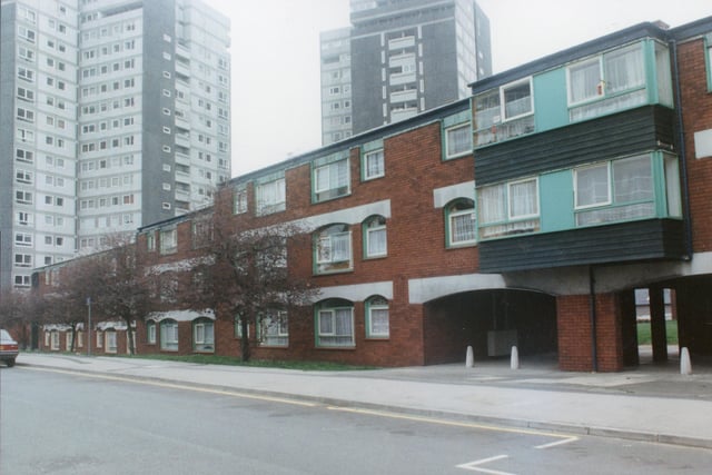 A view of some of the maisonettes which feature in the Avenham estate, with the soaring tower blocks in the background