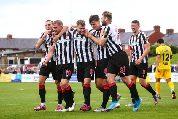 Chorley's Ollie Shenton, centre, celebrates after scoring in the 4-1 win over Chester earlier in the season
