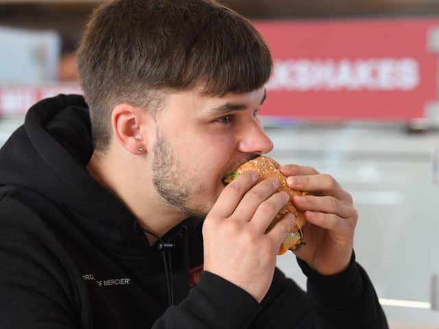 Jordan tucking into his burger.