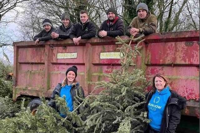 The Rainbow  team ready to recycle your trees
