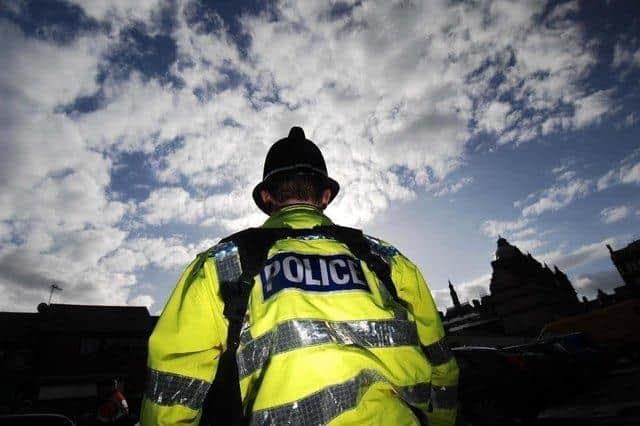 Police have identified two young men in connection with a robbery in Preston in which a man was threatened with a knife.