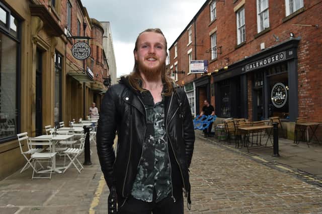 Luis Pearson-dore, manager of Lonely People in Winckley Street in Preston is delighted that the street is to be closed for the Queen's Jubilee Weekend