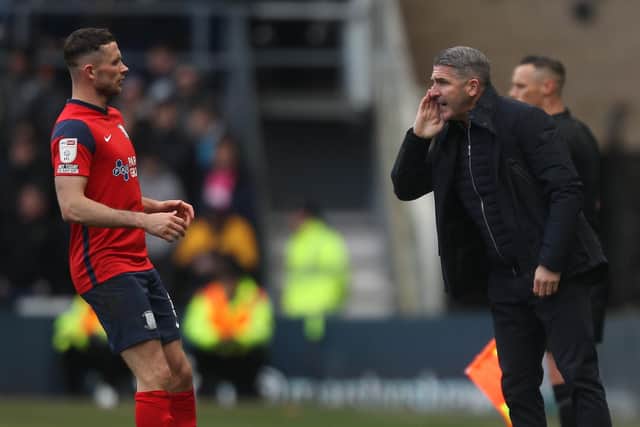 Preston North End manager Ryan Lowe gives instructions to skipper Alan Browne