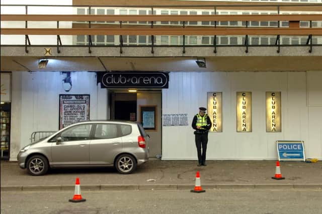 Police outside Club Arena (formerly The Piper) after a gun blasted a hole in the ceiling in 2008.
