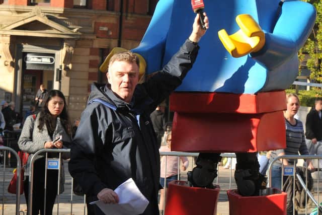 Preston’s Flag Market becomes an outdoor cinema as part of a Familyfest, with BBC Radio Lancashire's John Gillmore interviewing the Lego man