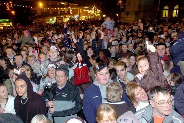 So many faces in the crowd for this Christmas lights switch-on at Preston Flag Market in 2005