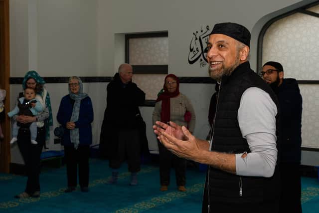 Welcoming visitors from St Stephen's Church to the new Masjid-E-Saliheen Mosque on Grafton Street, Preston. Photo: Kelvin Stuttard