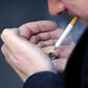 Litter enforcement officer said I had committed a crime as soon as the cigarette hit the floor
