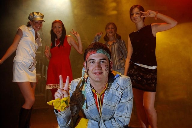 Chris Smithson, 16, with cast members (from left) Vickie Smith, 17, Natasha Ward, 17, Nicola Jaques, 17, and Steph McLaughlin, 16, from the production of Top Rank Groovy at Cardinal Newman College in Preston
