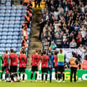 Preston North End players celebrating at the end of the match in front of their fans at Coventry City.
