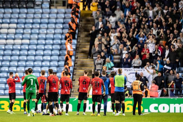 Preston North End players celebrating at the end of the match in front of their fans at Coventry City.