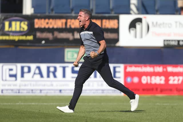 Preston North End manager Ryan Lowe celebrates at the end of the match.