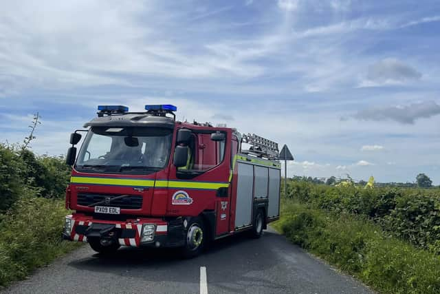 Emergency services at the scene just off Bentham Road near Burton in Lonsdale, where a helicopter crashed. Picture by Thomas Beresford.