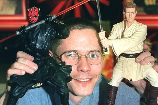 Star wars merchandise arrived at Toys R Us at Deepdale Retail Park in 1999. General Manager Jim Broadbent is pictured here with Darth Maul and Ob1-Kenobi