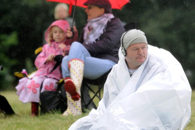 Sheltering from the Bank Holiday weather during the Sheffield Jubilee Fayre at Norfolk Park in 2012