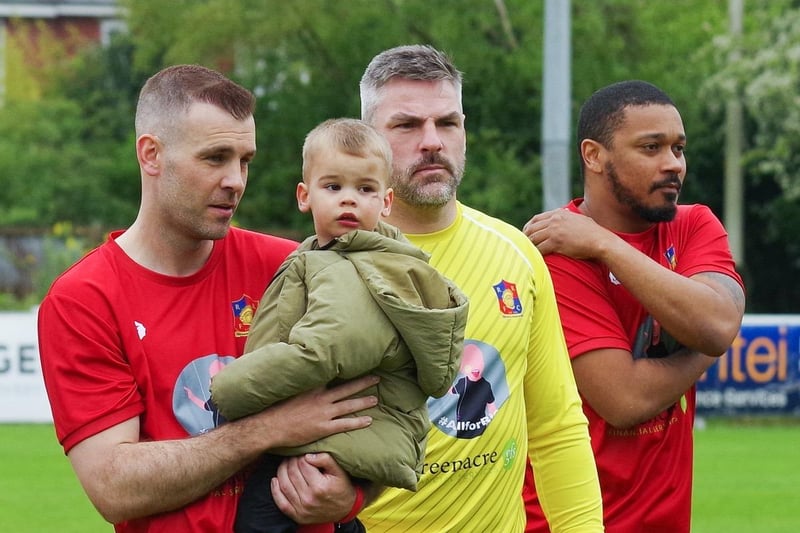 Tommy Spurr holds other son Rudy, next to Matt Gilks and Chris Humphrey ready for the game