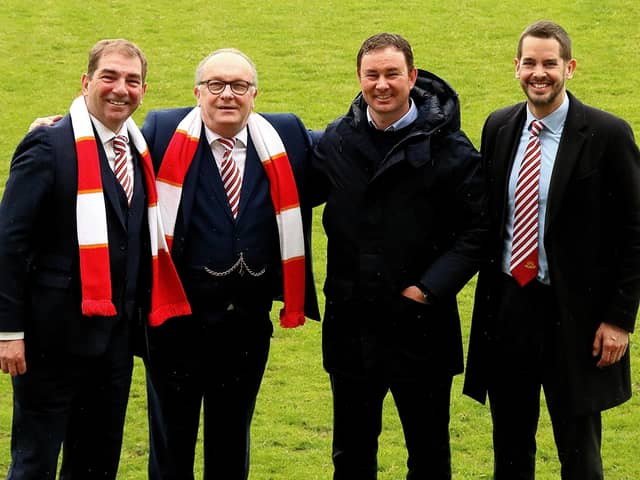 Morecambe co-chairmen Graham Howse and Rod Taylor, manager Derek Adams and director James Wakefield have all been waiting for a takeover to happen Picture: Michael Williamson