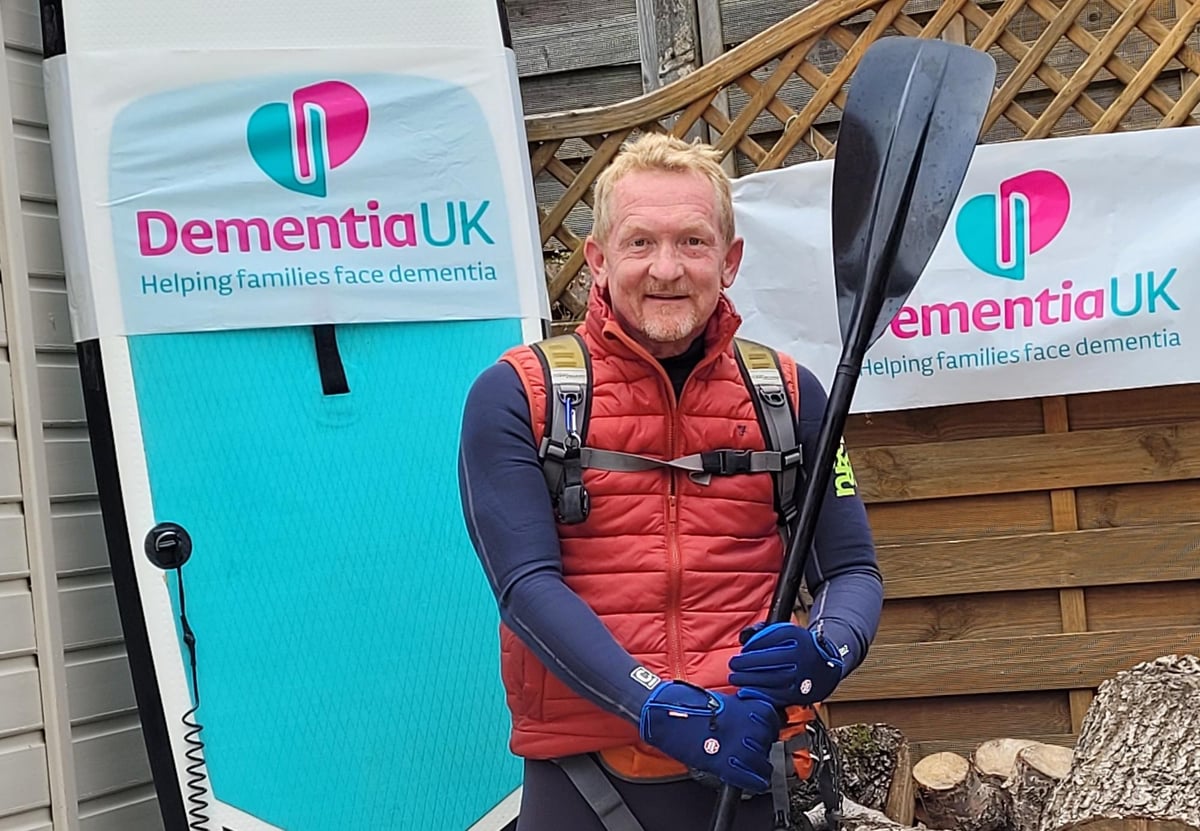 Intrepid paddleboarder Gareth's delight at conquering River Ribble - and elements - to boost charity fund.