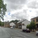 A woman died in hospital after a car collided with a building at the junction of Manchester Road and Hollins Lane in Accrington (Credit: Google)