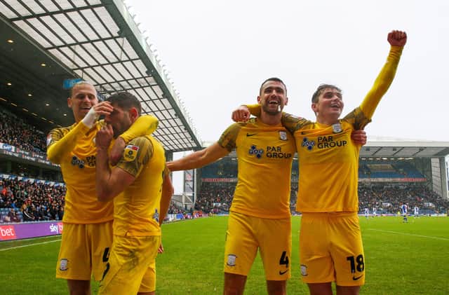 Preston North End players celebrate their third goal