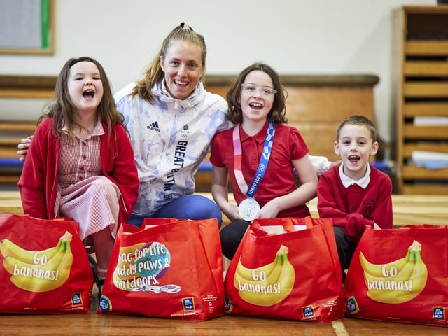 Team GB athlete (cyclist) Josie Knight doing aa assembly at Sacred Heart Catholic Primary in Preston after opening Aldi Portway. From left: Isabelle 8, Josie, Willow 10 and Alfie 8.
