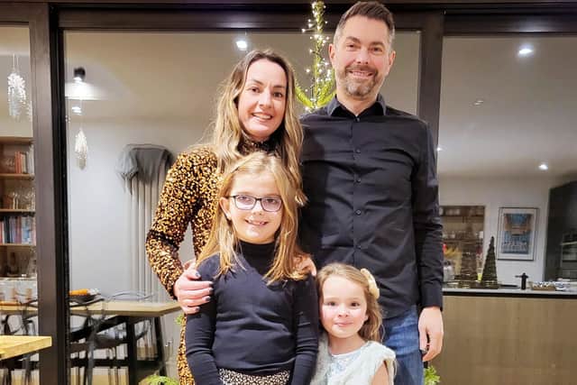 David Simmons (pictured with wife Kate and daughters Isla and Esme) suffered stroke aged 41.