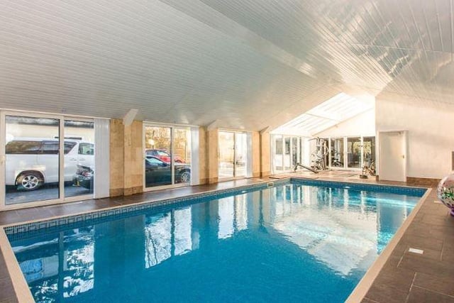 This five-bedroomed house boasts this impressive pool and gym area as well as extensive gardens and electric gates.
The price tag? £1.3m.