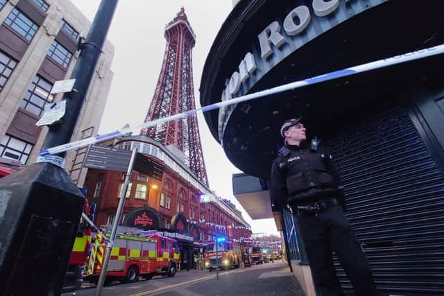A story to tell the grandchildren - Panic set in as news that Blackpool Tower was on fire circled the Internet on Thursday (October 28). 
Witnesses spotted what they said were "flames" coming from a metal section near the top of the tower in the afternoon.
Lancashire Fire and Rescue Service (LFRS) sent six fire engines and a "rope rescue" team to the scene.
However, what they found was not in fact a fire but .... orange netting which has lent itself to various jokes and memes on the internet. 
A 43-year-old man has since been arrested and detained under the Mental Health Act.