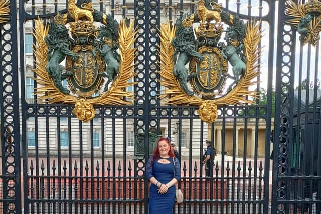 Rebecca Ramsay outside Buckingham Palace