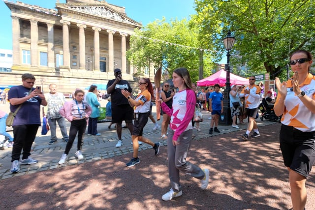 Nina Kennedy takes part in The Queen's Baton Relay as it visits Preston