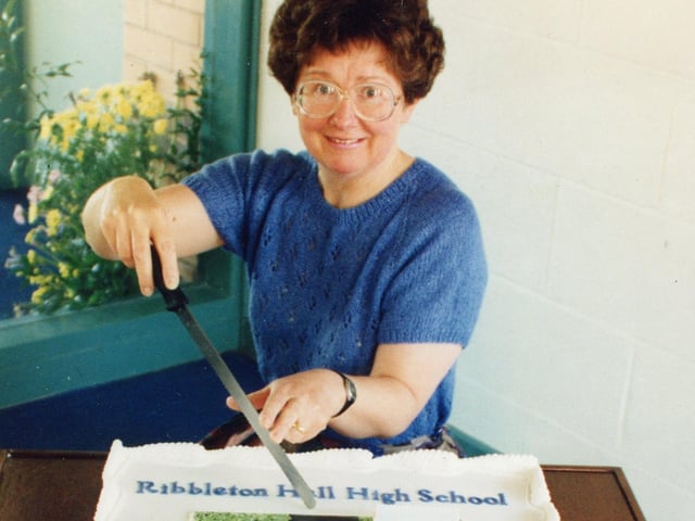 The icing on the cake at the official opening of a Preston school was a giant confectionary masterpiece made by a grateful mum. Mrs Judith Porter (pictured), who is a part-time lecturer in cake decoration at Preston College, decided to do something special for the formal opening of the new £4m Ribbleton Hall High School. All three of her children were taught at the school