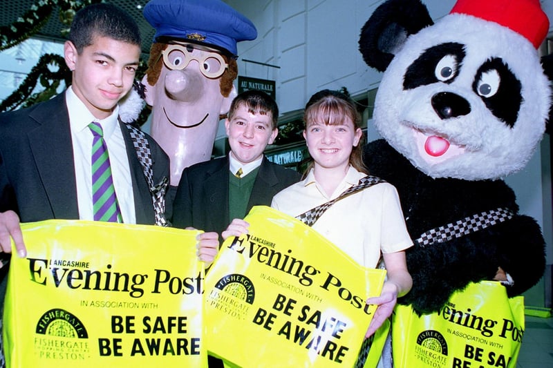 From left: Newspaper deliverer Aaron Chambers, Postman Pat, Chris Burrow from Broughton High School,  Newspaper deliverer Rebecca Dewhurst and the Panda, at the Fishergate Shopping Centre, Preston.