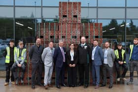 Persimmon Homes has donated 10,00 bricks to Preston College
Louise Doswell, Principal, Preston College, Kevin Farrington, Managing Director, Persimmon Homes Lancashire with four construction apprentices alongside representatives from Preston College and Persimmon Homes.