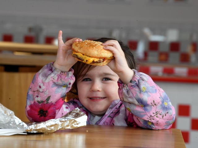 Sophie was all smiles as she tucked into her burger!