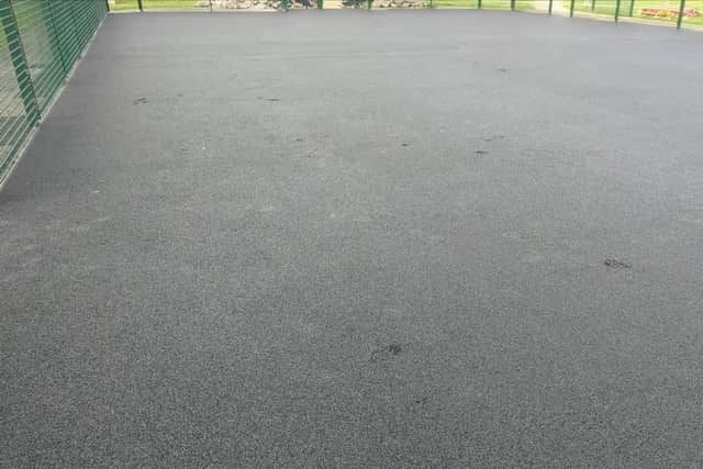 Contractors found footprints had been left in the freshly laid tarmac as well as beer cans scattered across the ground (Credit: Catterall Parish Council)