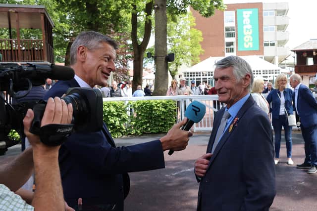 Trainer Eric Alston (right) talking to Stewart Machin of Racing TV in the winners’ enclosure at Haydock (photo: The Jockey Club/Grossick Photography)
