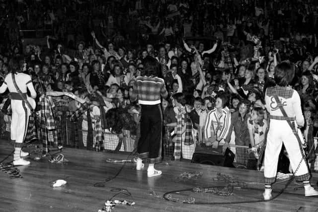 The Rollers on stage