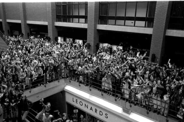 Crowds waited eagerly in the Guild Hall