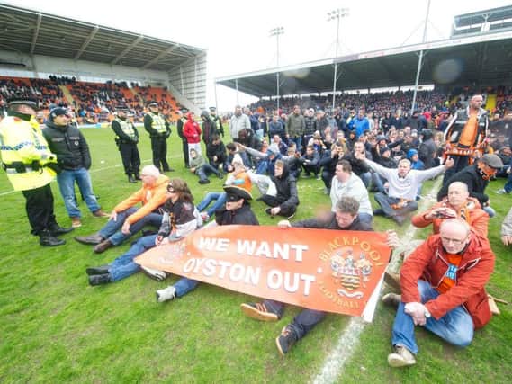 Fans staged an on-pitch protest during the match against Huddersfield in 2015. The game was abandoned