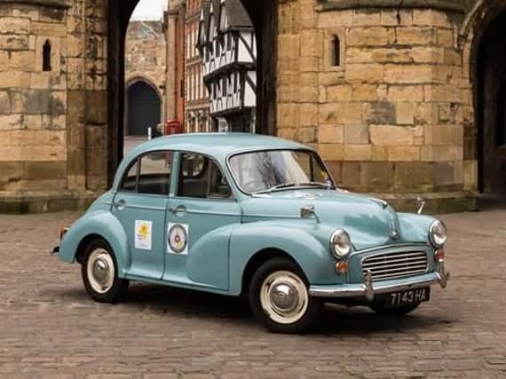 A 1963 4 door saloon Morris Minor which is touring the UK