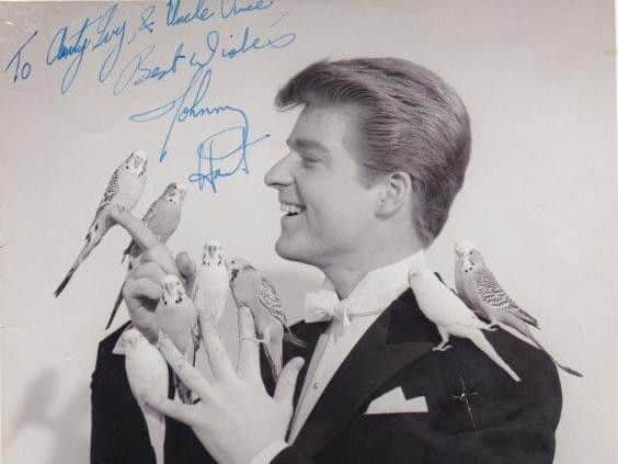 Johnny Hart with his beloved budgies