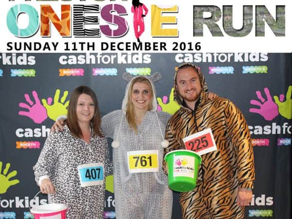 DJ Fiona Sadler (centre) Kirsty Britt (left), Senior Operations Manager and Mark Parkinson (right), Events Development Officer of Event Management Company Pennine Events launch Onesie Run UK for Cash for Kids