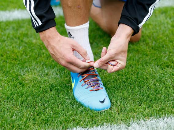 Footballers have shown their support in the past wearing Rainbow Laces