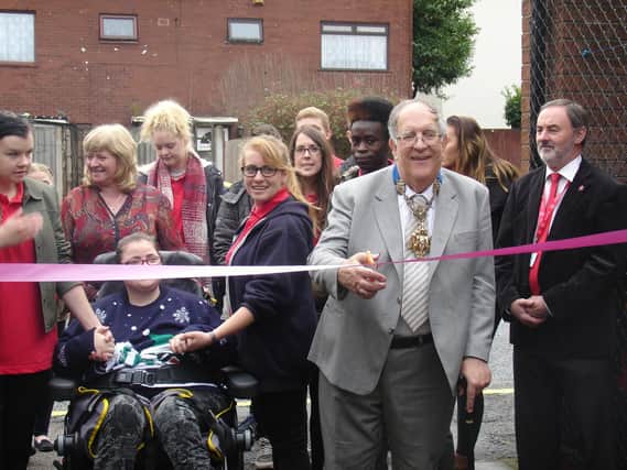 Preston Mayor, Coun John Collins, helps to unveil the new garden at Caritas Care's FX Project