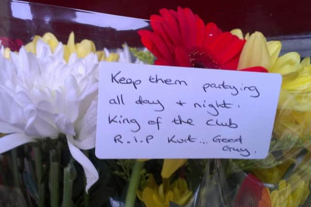 Tributes to Kurt Smith have been placed outside The Rose and Crown pub in St Thomas's Road, Chorley