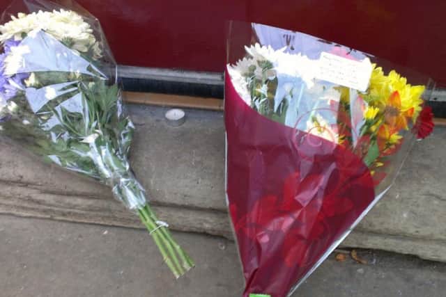 Tributes to Kurt Smith have been placed outside The Rose and Crown pub in St Thomas's Road, Chorley