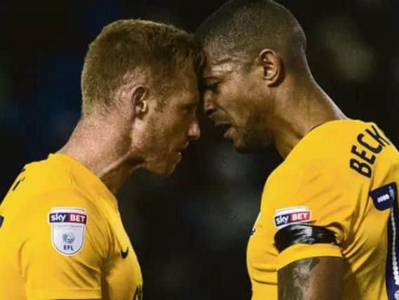 PNE strikers Eoin Doyle and Jermaine Beckford clash at Hillsborough